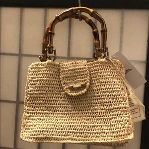 Straw purse with bamboo handles